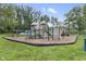 Community playground area with swings, slides, and climbing structures at 6288 Buttonwood Dr, Noblesville, IN 46062