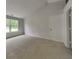 Comfortable bedroom with plush carpeting, a large window, and a neutral color palette at 7018 Mallard Way, Plainfield, IN 46168