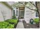 Inviting entrance to a charming home with well-maintained landscaping and a welcoming front door at 7110 Koldyke Dr, Fishers, IN 46038