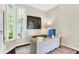 Bright office space with lots of natural light, modern desk, and stylish decor at 7110 Koldyke Dr, Fishers, IN 46038