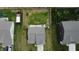 Aerial view of a home with a fenced backyard and surrounding greenery showcasing the property layout at 7303 Beal Ln, Indianapolis, IN 46217