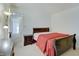 Bright bedroom featuring a comfortable bed, dresser, and natural light at 7303 Beal Ln, Indianapolis, IN 46217