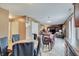 Open concept dining area leads into living space with neutral colors and abundant natural light at 7303 Beal Ln, Indianapolis, IN 46217