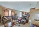 Comfortable living room offering backyard views and seamless flow into the kitchen space at 7303 Beal Ln, Indianapolis, IN 46217