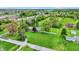 Aerial view of the home, its expansive grounds, and the surrounding neighborhood at 7425 E Thompson Rd, Indianapolis, IN 46239