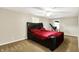 Spacious bedroom featuring a comfortable bed, ceiling fan, and ample natural light at 7425 E Thompson Rd, Indianapolis, IN 46239