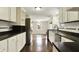 Charming kitchen with modern stainless steel appliances and tile backsplash for easy cooking at 7425 E Thompson Rd, Indianapolis, IN 46239