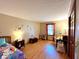 Cozy bedroom with colorful decor, featuring a single bed, study desk and unicorn plush, perfect for a room at 7621 Forest Dr, Fishers, IN 46038