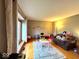 Inviting living room with hardwood floors, plush seating, and ample natural light at 7621 Forest Dr, Fishers, IN 46038