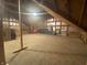 Large unfinished attic space featuring wood rafters, wood floor, and storage space at 7916 N Lasalle Rd, Morgantown, IN 46160