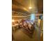 Cozy bedroom features log walls, carpeted floors, a window, and a comfortable bed with a bear-themed comforter at 7916 N Lasalle Rd, Morgantown, IN 46160