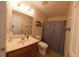 Cozy bathroom with single sink vanity, tiled floor, and shower/tub combination at 8310 Goat Hollow Rd, Martinsville, IN 46151