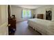 Bright bedroom with plush carpet, natural light, and walk-in closet for ample storage at 8310 Goat Hollow Rd, Martinsville, IN 46151