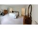 Spacious bedroom with plush carpet and a connected bathroom with a toilet at 8310 Goat Hollow Rd, Martinsville, IN 46151