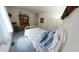 Bedroom featuring soft blue carpet and natural light, creating a tranquil retreat at 8310 Goat Hollow Rd, Martinsville, IN 46151