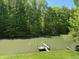 Backyard view of pond and dock at 8310 Goat Hollow Rd, Martinsville, IN 46151