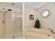 This bathroom features a walk-in shower and a soaking tub at 8548 Scarsdale W Dr, Indianapolis, IN 46256