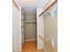 This closet features built-in shelving and clothing rods at 8548 Scarsdale W Dr, Indianapolis, IN 46256