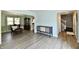 Open-concept living and dining room with hardwood floors, and fresh paint at 8548 Scarsdale W Dr, Indianapolis, IN 46256