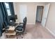 Bedroom features a workspace with a black office chair and computer setup at 8814 W 30Th St, Indianapolis, IN 46234
