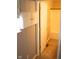 Bathroom entrance featuring white cabinets above the toilet and a tub-shower combination at 8912 Hosta Way, Indianapolis, IN 46113