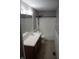 Bathroom with a vanity, mirror, toilet and full-sized shower and tub combination at 8912 Hosta Way, Indianapolis, IN 46113