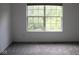 Bedroom featuring a large window and gray carpet at 8912 Hosta Way, Indianapolis, IN 46113