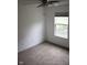 Bedroom with a window allowing plenty of natural light and a ceiling fan at 8912 Hosta Way, Indianapolis, IN 46113