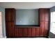 A wall of custom built-in cabinets with countertop space and ample storage at 8912 Hosta Way, Indianapolis, IN 46113