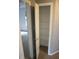 Open closet with shelving, offering ample storage space in this home at 8912 Hosta Way, Indianapolis, IN 46113