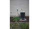 Exterior showcasing the air conditioning unit, landscaping and green yard at 8912 Hosta Way, Indianapolis, IN 46113