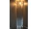 Hallway with light fixture and view of stairs at 8912 Hosta Way, Indianapolis, IN 46113