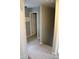 Hallway with carpet and view of doorway at 8912 Hosta Way, Indianapolis, IN 46113
