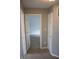 Hallway with access to a bedroom and utility closet at 8912 Hosta Way, Indianapolis, IN 46113