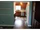 View of the open kitchen with stainless steel appliances and wood cabinets at 8912 Hosta Way, Indianapolis, IN 46113