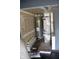Utility room with a water heater, furnace, and new flooring materials ready for installation at 8912 Hosta Way, Indianapolis, IN 46113