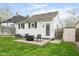 Cozy backyard featuring a patio with seating and a well-maintained lawn, perfect for outdoor relaxation and entertaining at 940 E Pleasant Run Parkway North Dr, Indianapolis, IN 46203