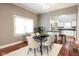 Cozy dining room with stylish decor and lots of natural light, leading to the modern kitchen at 940 E Pleasant Run Parkway North Dr, Indianapolis, IN 46203