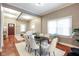 Inviting living space with a dark wood front door, hardwood floors, and neutral decor at 940 E Pleasant Run Parkway North Dr, Indianapolis, IN 46203