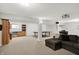 Finished basement offering entertainment space, media area, and built-in shelving units at 9583 Greenthread Dr, Zionsville, IN 46077