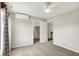 Comfortable bedroom with a ceiling fan, closet, and adjacent bathroom access at 9583 Greenthread Dr, Zionsville, IN 46077
