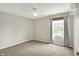 Cozy bedroom featuring a ceiling fan and a large window with natural light at 9583 Greenthread Dr, Zionsville, IN 46077