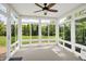 Bright sun room with lots of windows for natural light and nice backyard views at 9583 Greenthread Dr, Zionsville, IN 46077