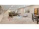 Finished basement featuring a large entertaining area with a comfortable seating arrangement at 9749 Soaring Eagle Ln, Fishers, IN 46055