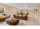 Basement with a comfortable seating arrangement and a cozy vibe, perfect for relaxation at 9749 Soaring Eagle Ln, Fishers, IN 46055