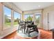 Breakfast nook features a table, seating, and large windows providing views of the backyard at 9749 Soaring Eagle Ln, Fishers, IN 46055