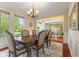 Bright dining room with ample seating and natural light, perfect for Gathering gatherings at 9749 Soaring Eagle Ln, Fishers, IN 46055