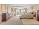 The main bedroom is spacious and features large windows and a seating area at 9749 Soaring Eagle Ln, Fishers, IN 46055