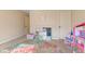 A Playroom showcasing colorful rug, neutral paint, and closet for storage at 9749 Soaring Eagle Ln, Fishers, IN 46055