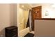 Bathroom featuring shower/tub combo with a dark brown door at 9903 E Raymond St, Indianapolis, IN 46239